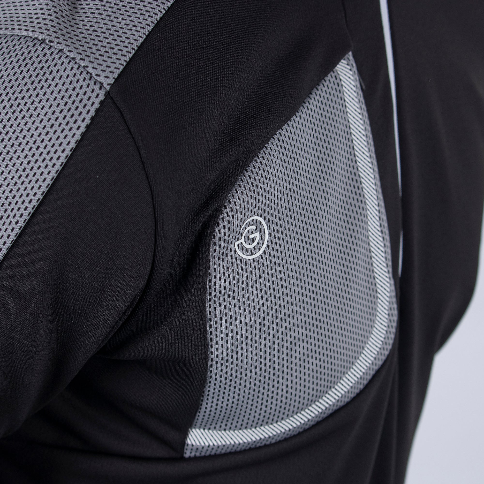 Black 'DWIGHT'  half-zip sweater in INSULA™ stretch fabric.