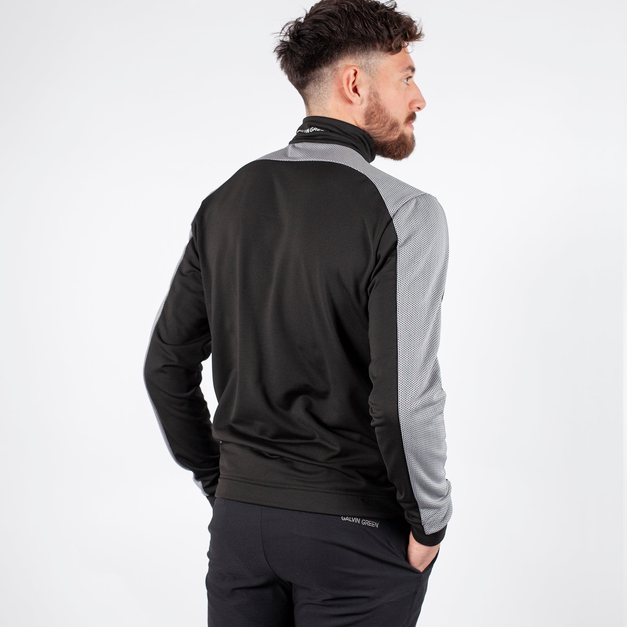 Black 'DWIGHT'  half-zip sweater in INSULA™ stretch fabric.